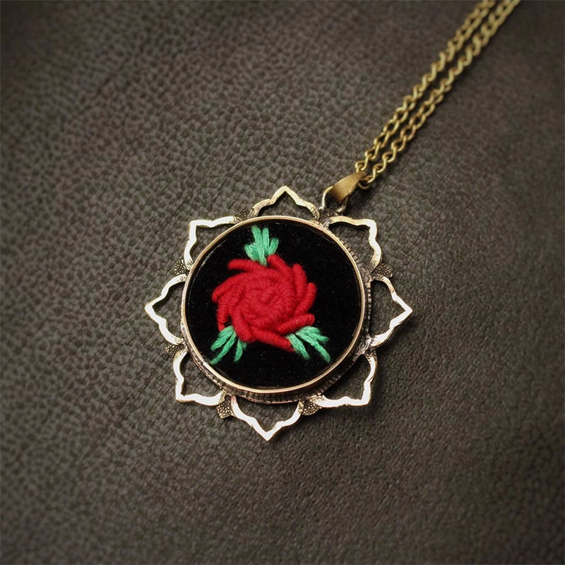 Brass Necklace with Red Embroidered Flower01 گردنبند دست ساز برنجی با گل قرمز گلدوزی شده